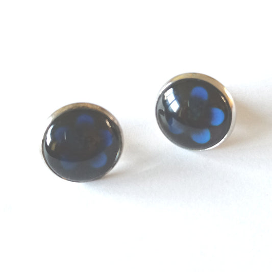 Boucle d'oreille en cabochon de verre. Motif bleu floral